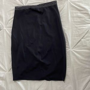 Black knee length slip to go under a dress